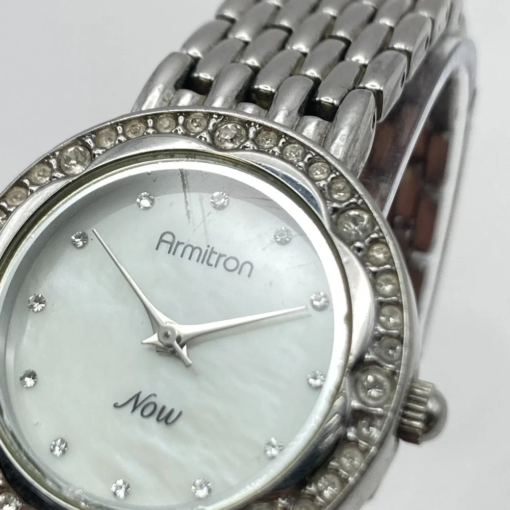 Armitron Now Women's Watch 28mm Silver Tone Crystals MOP Dial New Battery 6.75